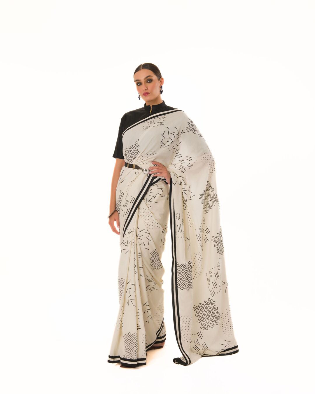 HAND STAMPED PRINTED SAREE WITH HAND CRAFTED STRIPED BORDER PAIRED WITH HI-NECK BLOUSE