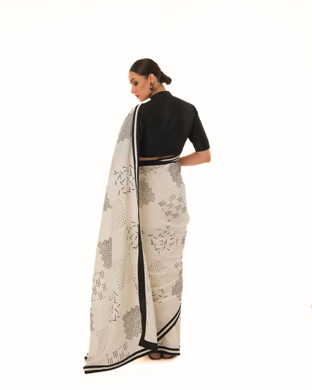 HAND STAMPED PRINTED SAREE WITH HAND CRAFTED STRIPED BORDER PAIRED WITH HI-NECK BLOUSE