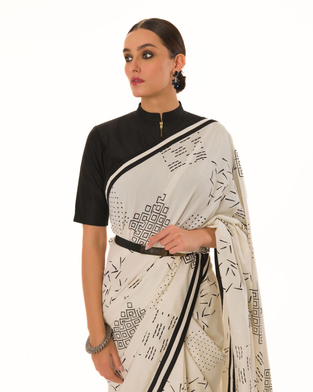 HAND STAMPED PRINTED SAREE WITH HAND CRAFTED STRIPED BORDER PAIRED WITH HI-NECK BLOUSE