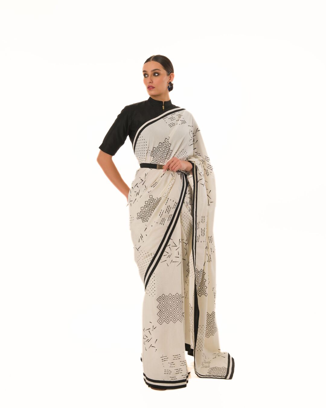 HAND STAMPED PRINTED SAREE WITH HAND CRAFTED STRIPED BORDER PAIRED WITH HI-NECK BLOUSE