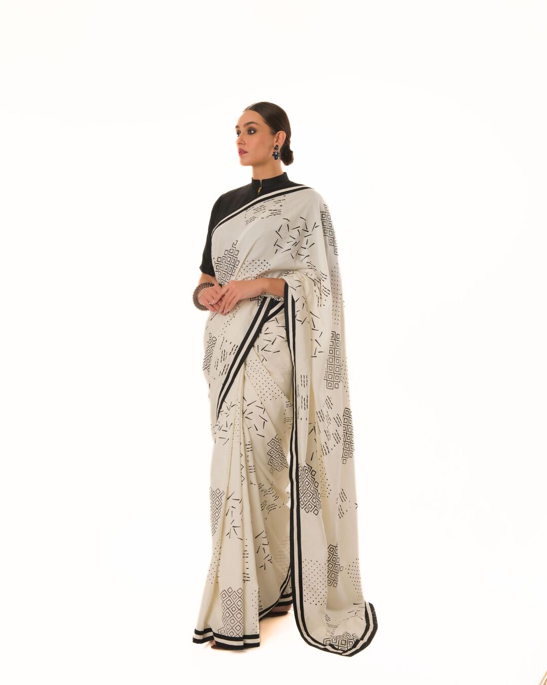 HAND STAMPED PRINTED SAREE WITH HAND CRAFTED STRIPED BORDER PAIRED WITH HI-NECK BLOUSE