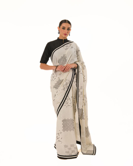 HAND STAMPED PRINTED SAREE WITH  HAND CRAFTED STRIPED BORDER PAIRED WITH  HI-NECK BLOUSE
