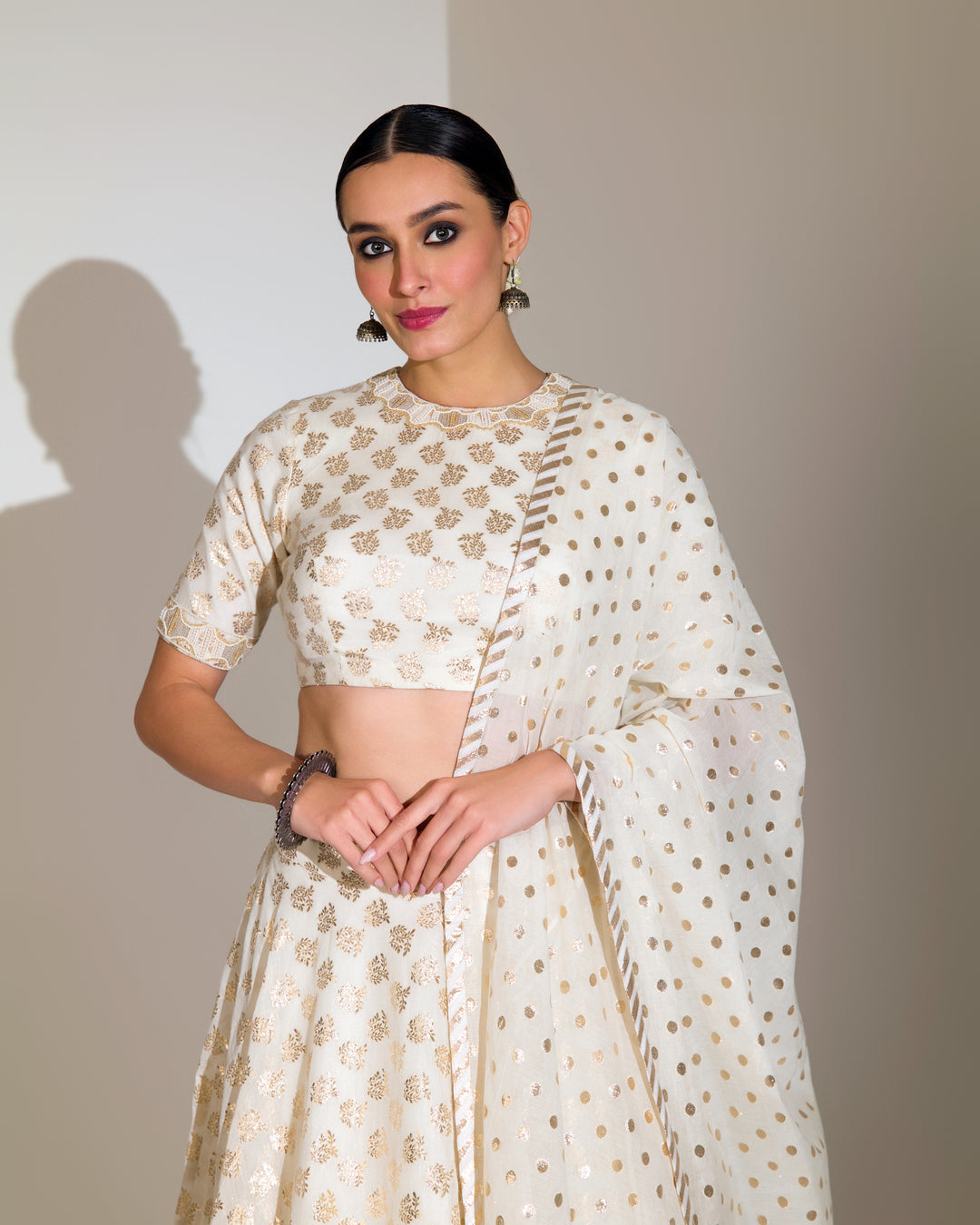 SHIMMERY IVORY & GOLD GRACEFUL EMBROIDERED LEHENGA SET